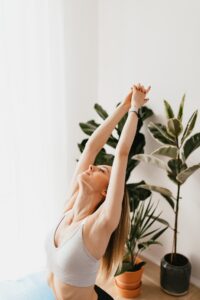 This picture shows a stretching woman